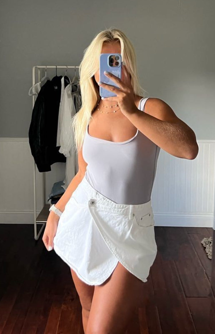 Alcmene White Denim Asymmetrical Wrap Mini Skirt — 11