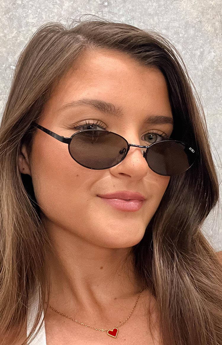 Otra Eyewear Rosie Black Oval Sunglasses — 1
