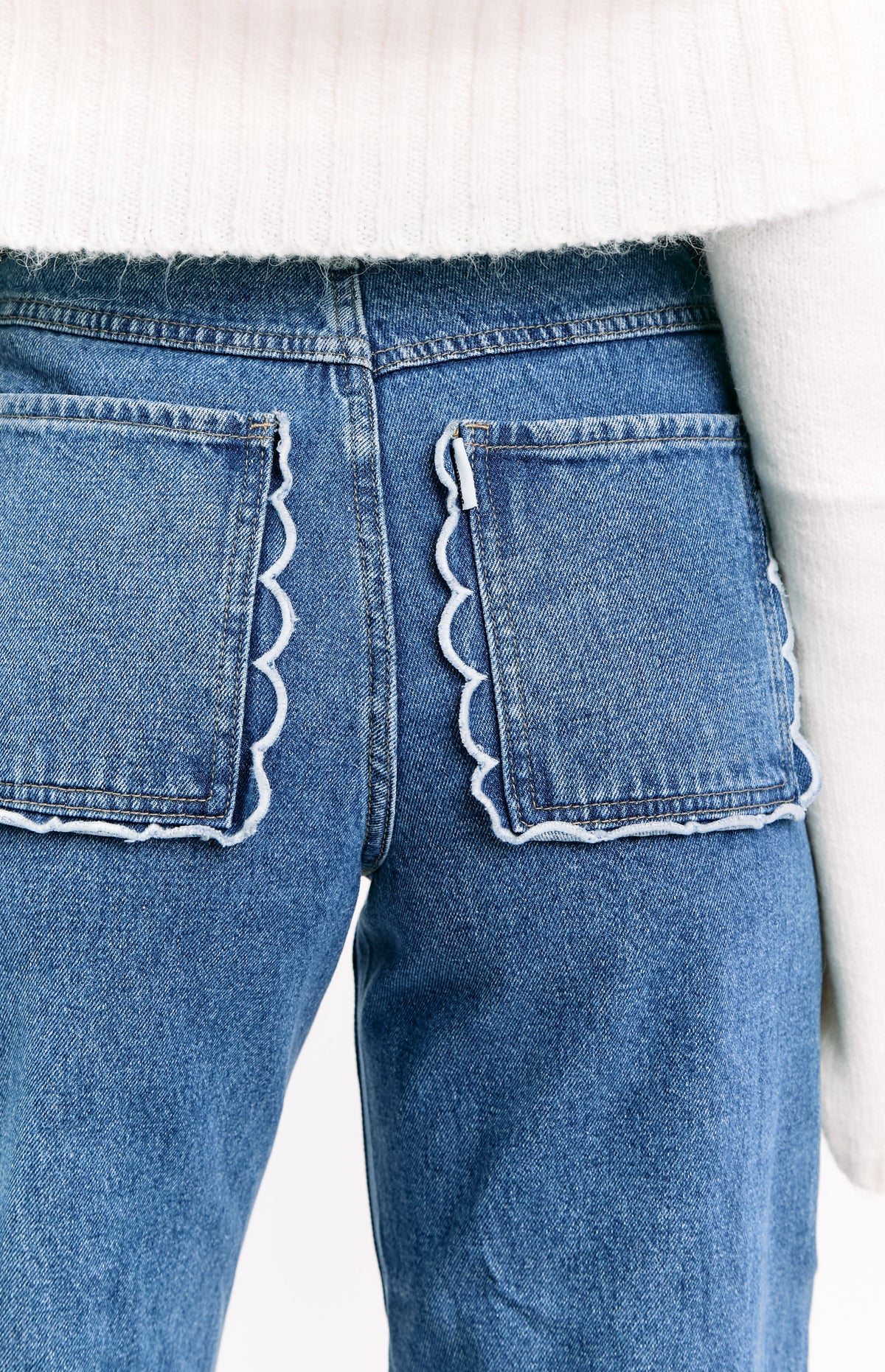Kansis Mid Wash Scallop Pockets Uneven Waist Jeans — 10