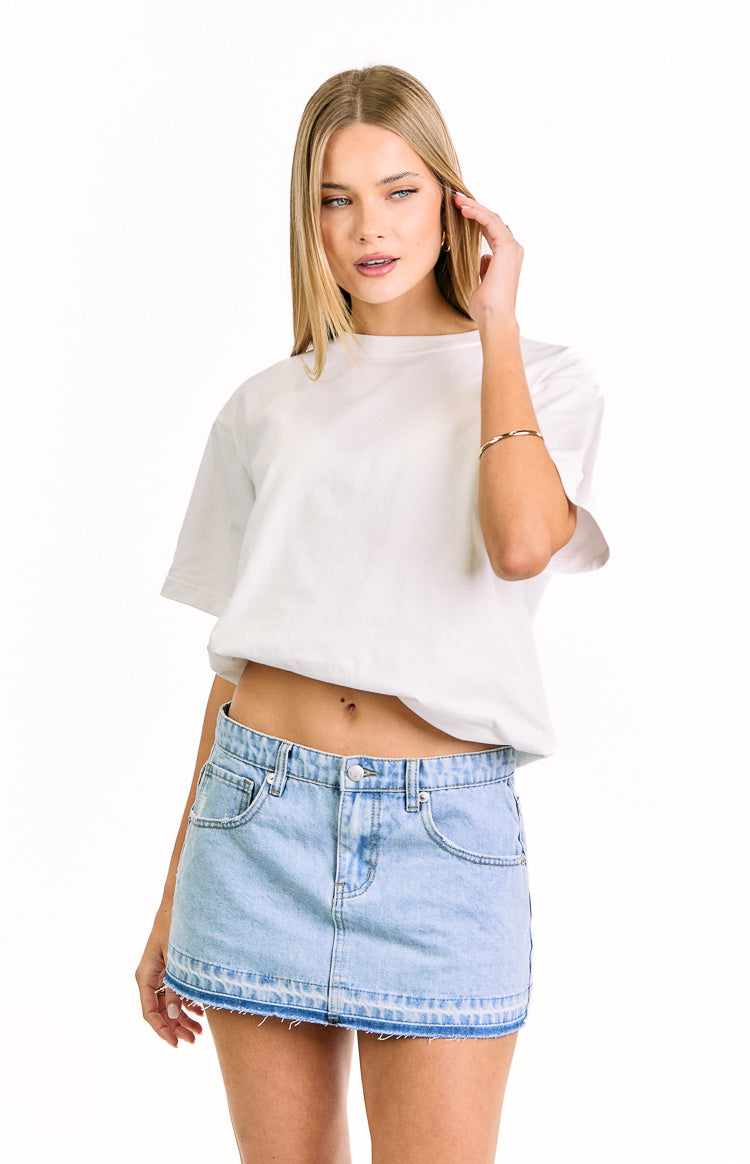 Emmy Light Wash Denim Distressed Mini Skirt — 1