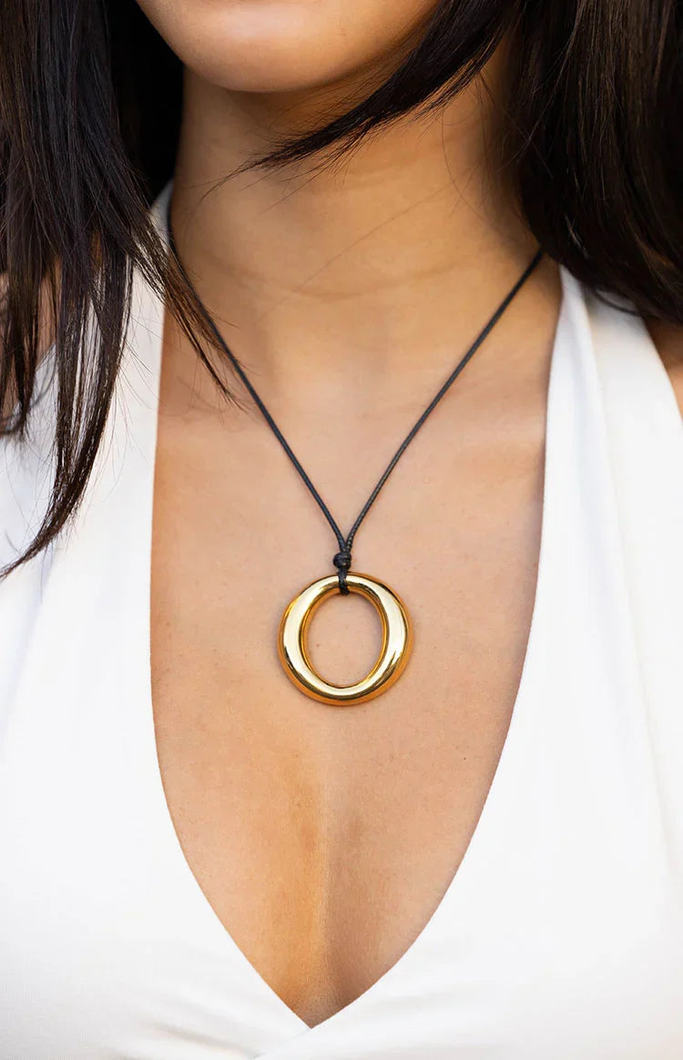 Brinley Gold and Black Pendant Necklace — 1