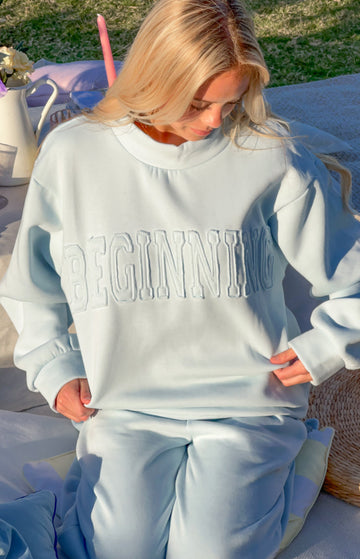 Remy Blue Applique Mock Neck Sweater — 1