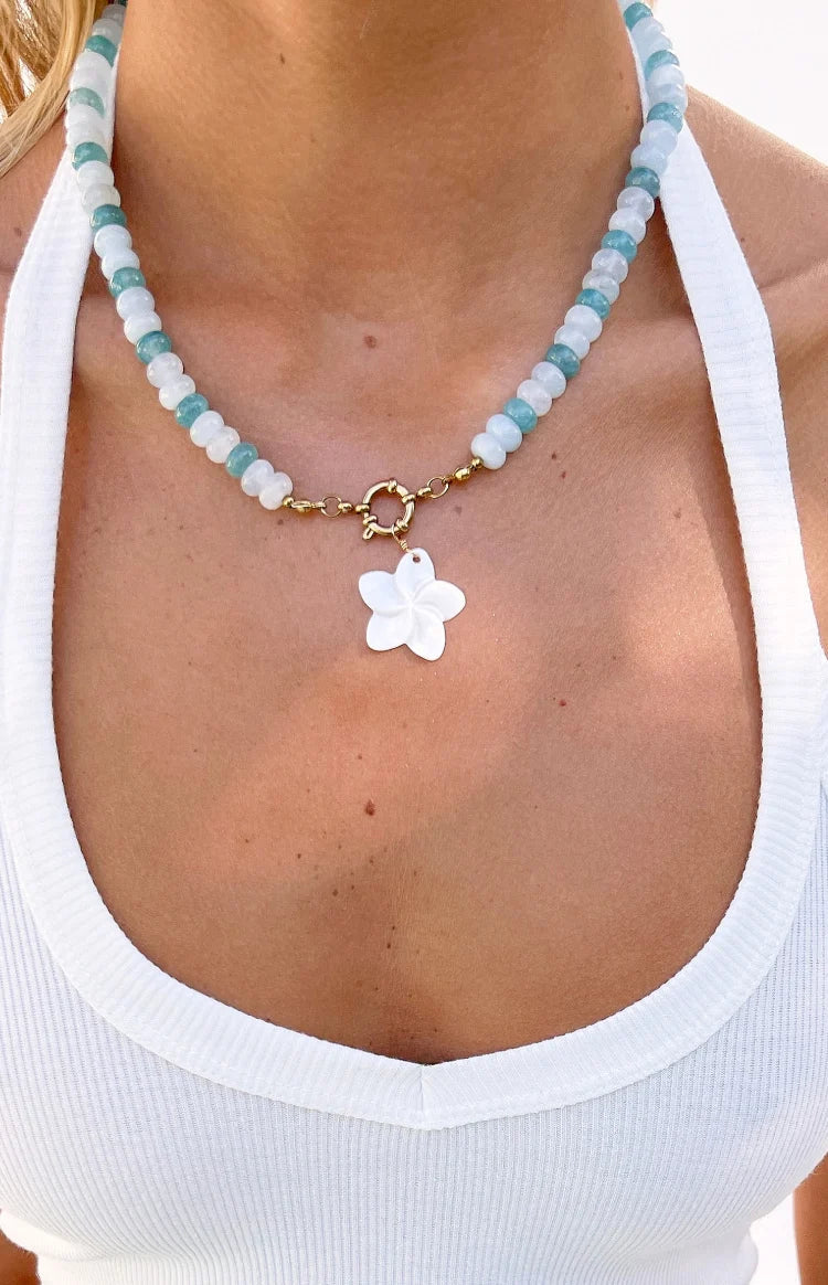 Roche Blue Beaded Flower Charm Necklace — 1